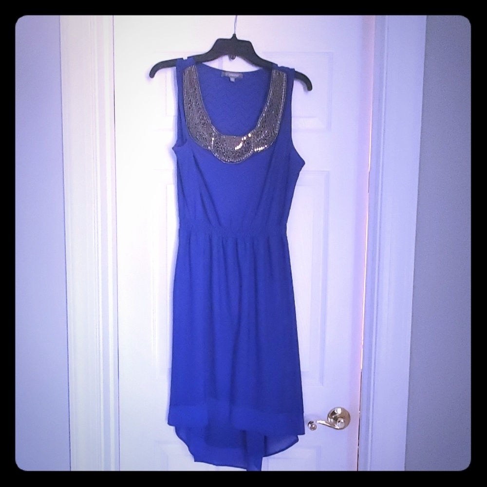 Elegant blue dress with stunning silver neckline